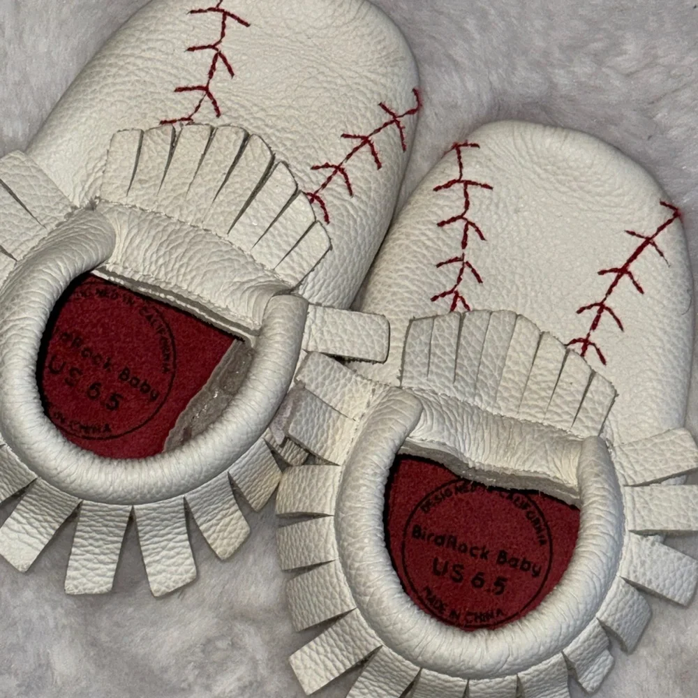 BirdRock Baby Home Run genuine leather baby moccasins with a baseball design.